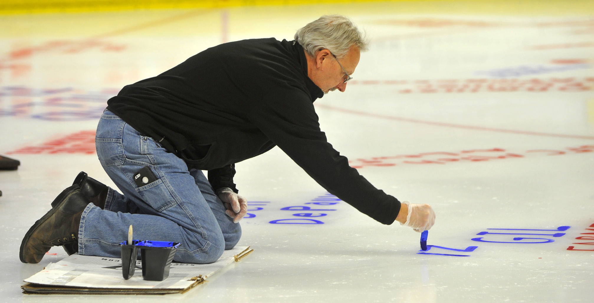 Salute To Military ice painting at the TaxSlayer Center